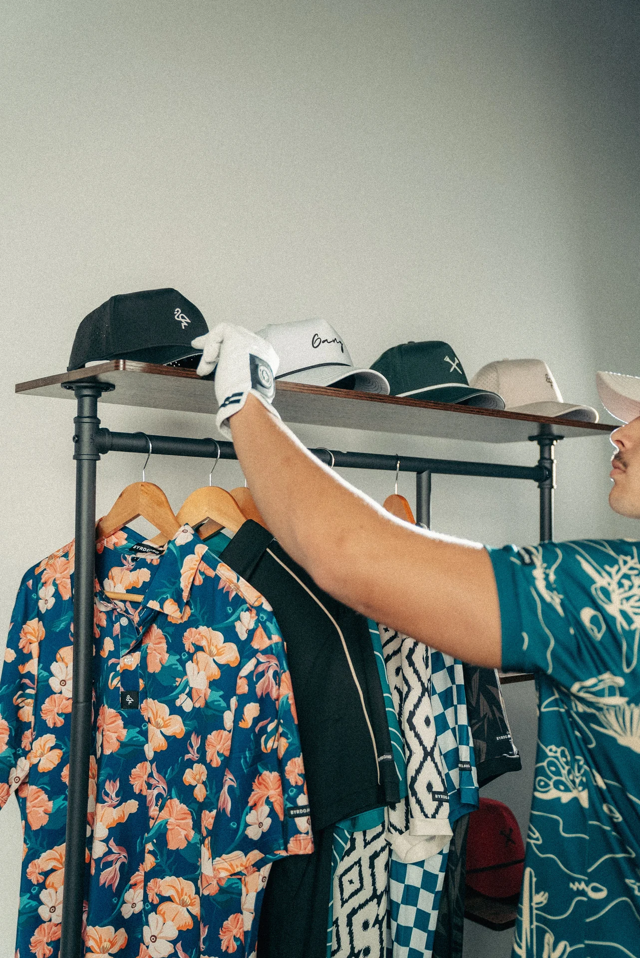 Byrd Gang polos and golf caps in the clubhouse