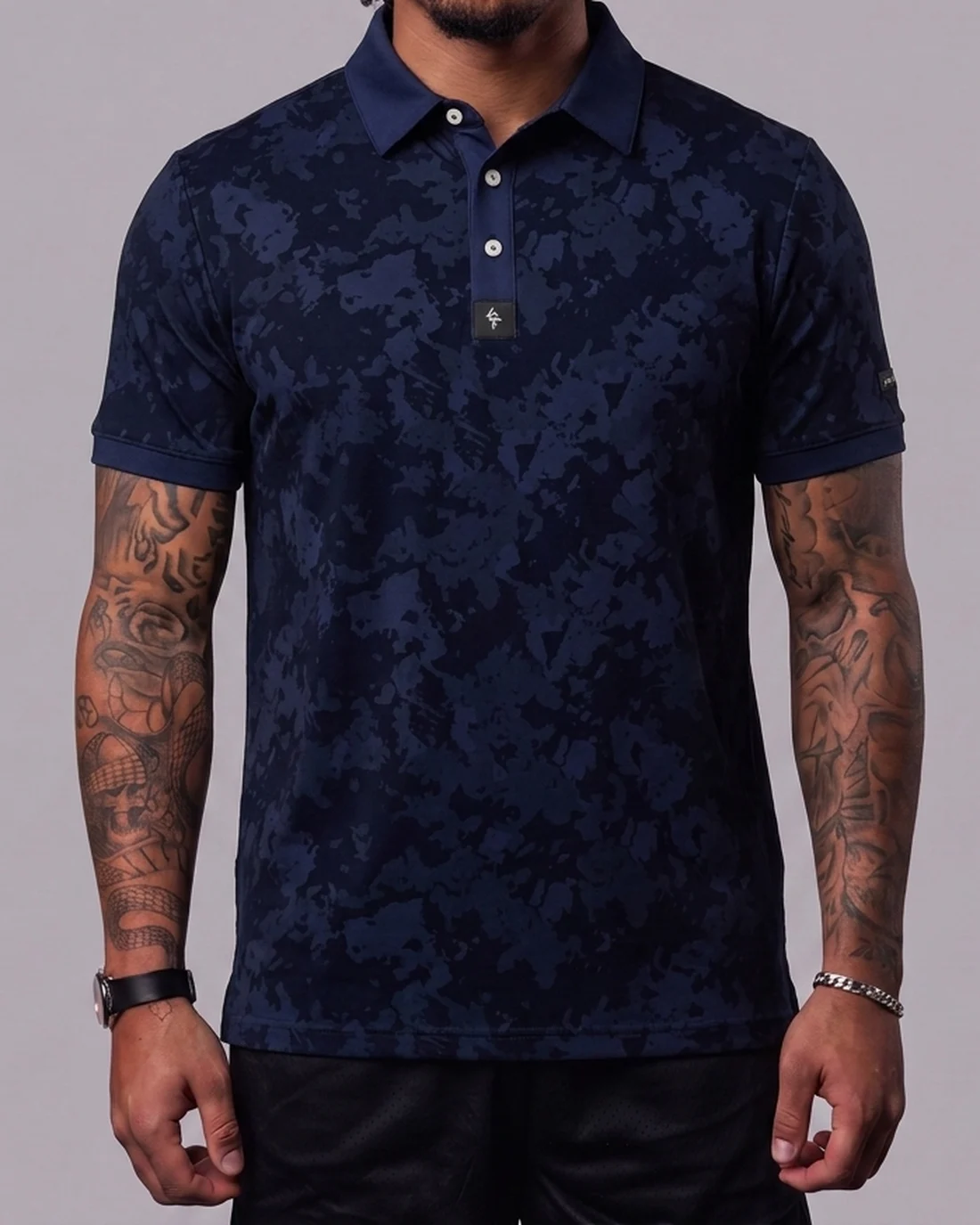 Model wearing the Byrd Gang Obsidian - Navy men’s polo