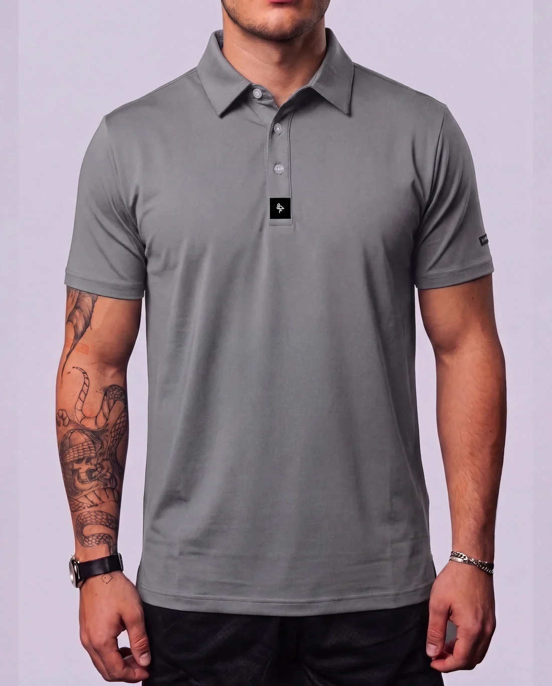 Model wearing the Byrd Gang Slate men’s polo